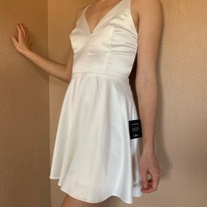 Super cute Lulus white backless dress. Size S. Never worn.